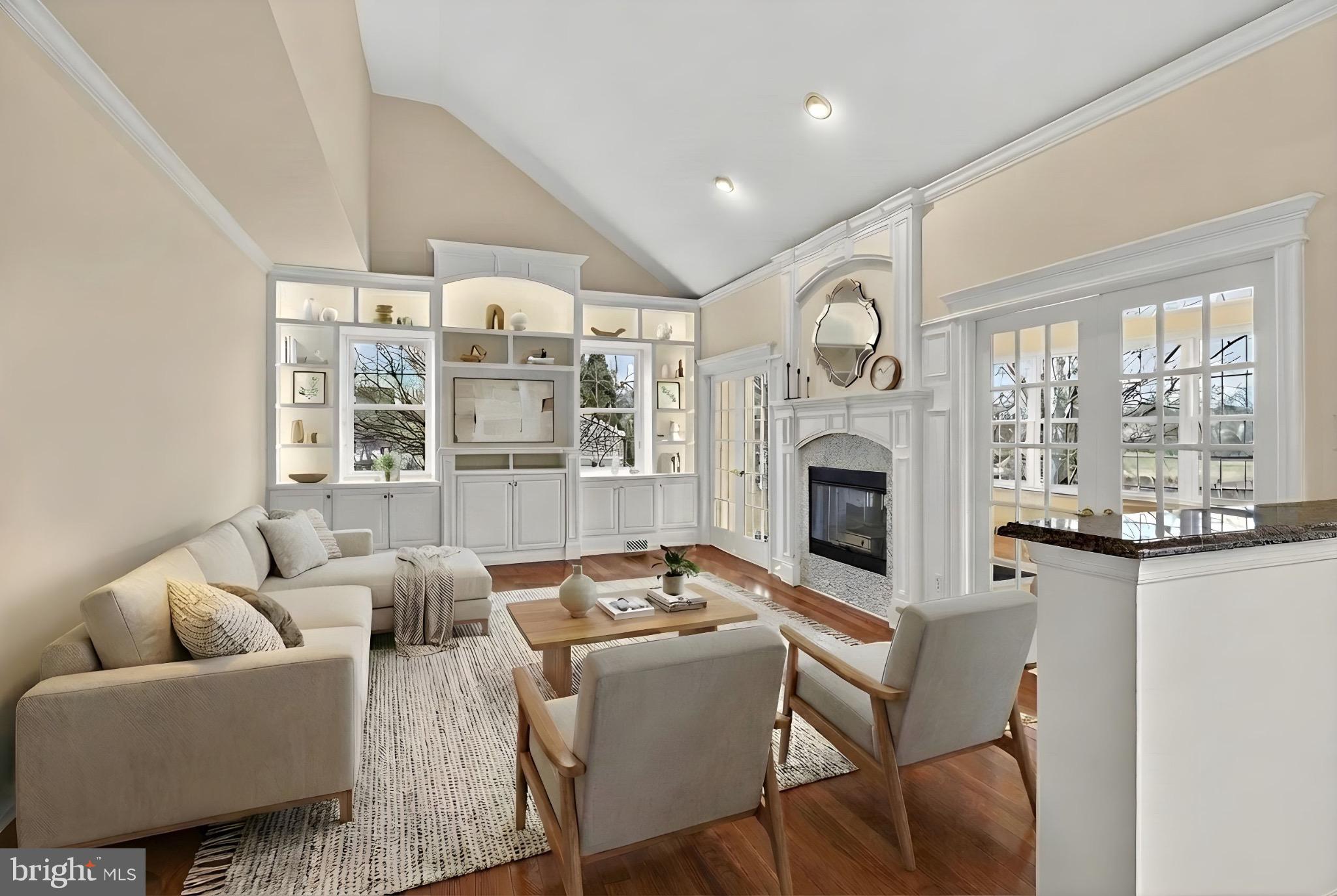 7 Anderson Lane Robbinsville, NJ 08691 - Photo 9 of 54 a living room with furniture a fireplace and a floor to ceiling window