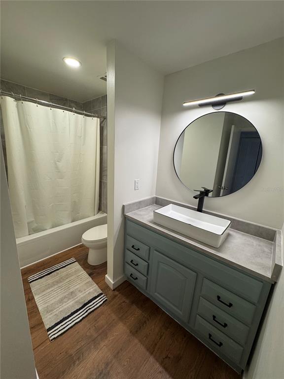530 Orange Drive, Unit 23 Altamonte Springs, FL 32701 - Photo 11 of 15 a bathroom with a double vanity sink and a mirror