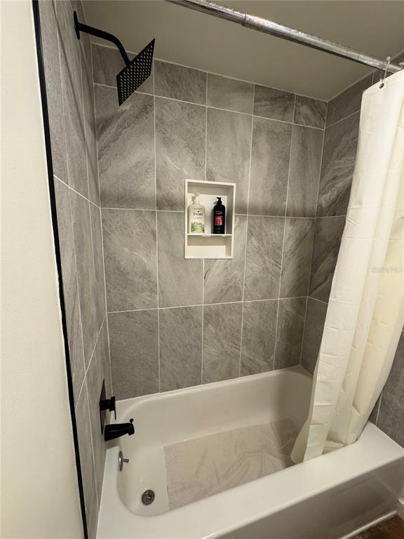 530 Orange Drive, Unit 23 Altamonte Springs, FL 32701 - Photo 12 of 15 a bathroom with a tub