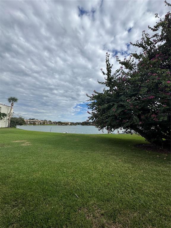 530 Orange Drive, Unit 23 Altamonte Springs, FL 32701 - Photo 13 of 15 a view of a trees in a yard