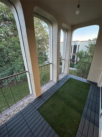 a view of a porch in front of a house