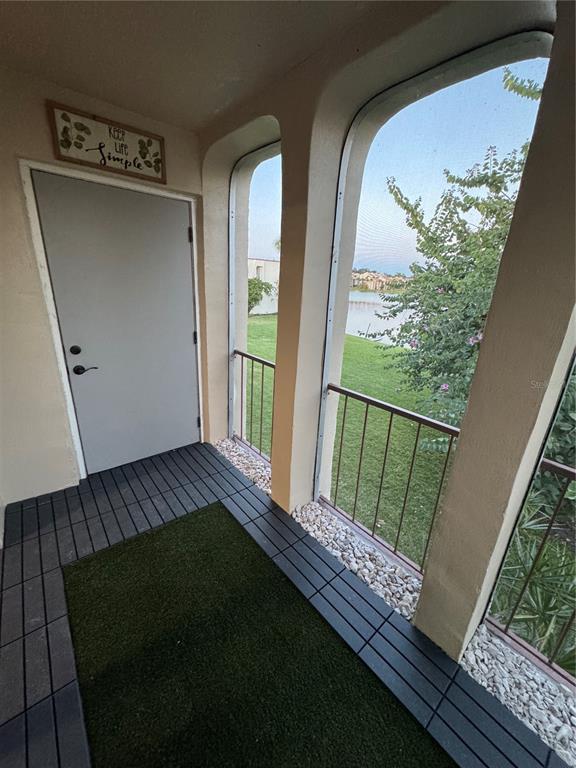 530 Orange Drive, Unit 23 Altamonte Springs, FL 32701 - Photo 15 of 15 a view of balcony with wooden floor