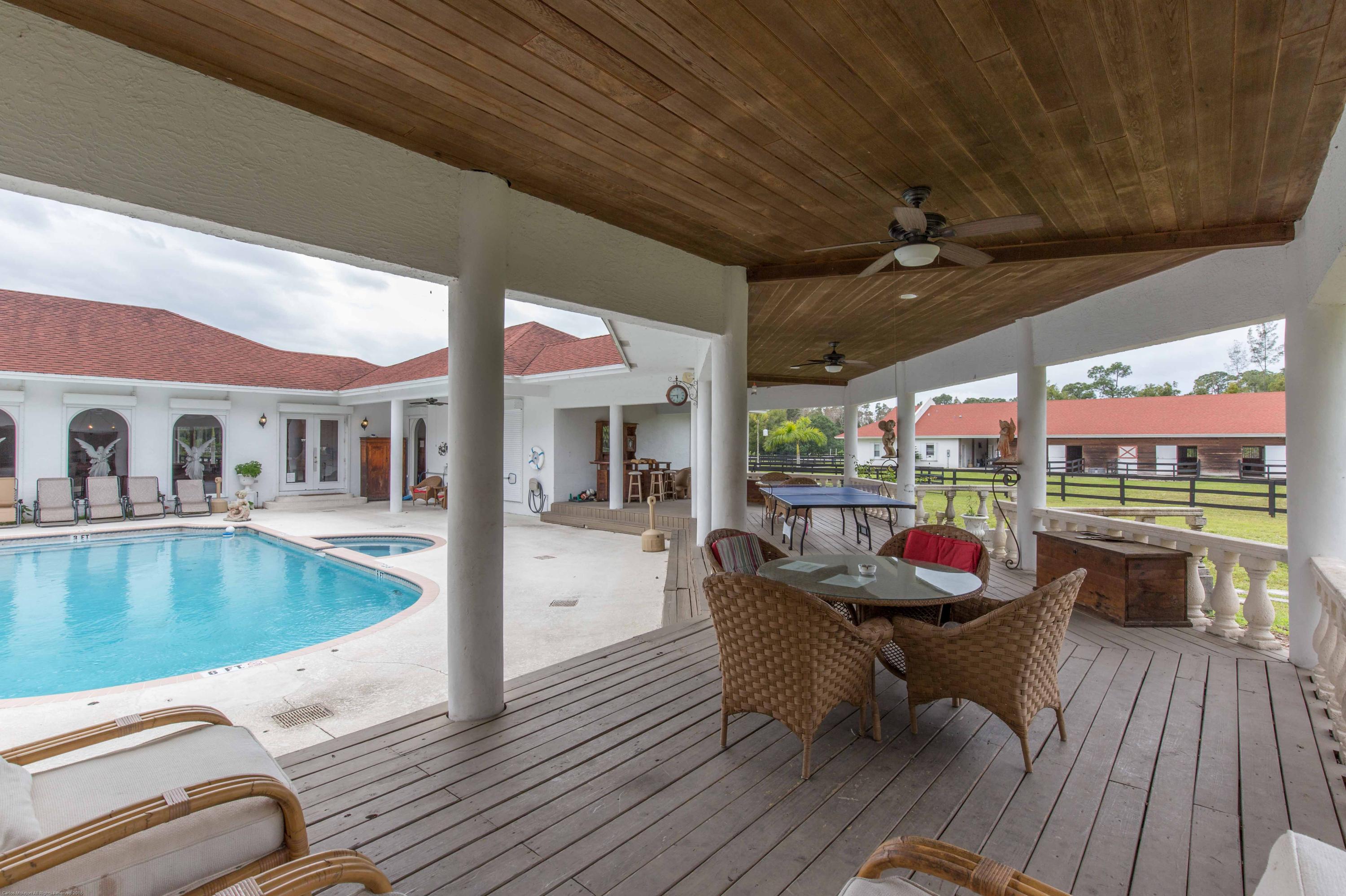 12981 Casey Road Loxahatchee, FL 33470 - Photo 86 of 86 Covered Veranda