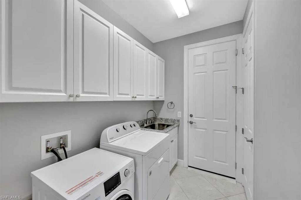 20014 Parrot Key Court Estero, FL 33928 - Photo 17 of 25 Laundry