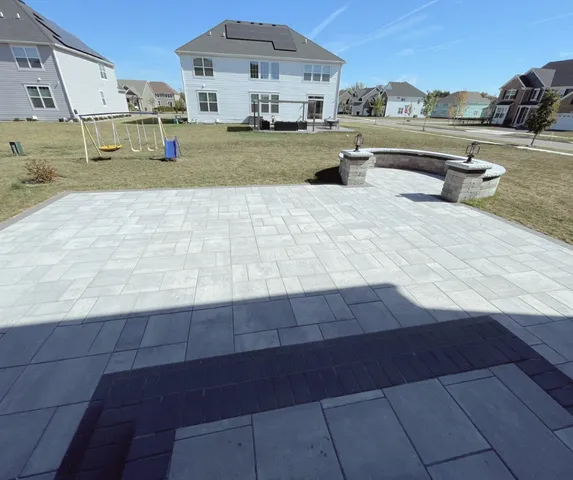 a view of a yard with cars