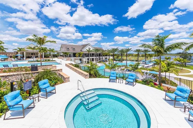 a view of a patio with swimming pool