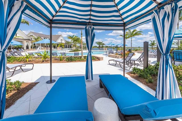 a front view of a house with a ocean view