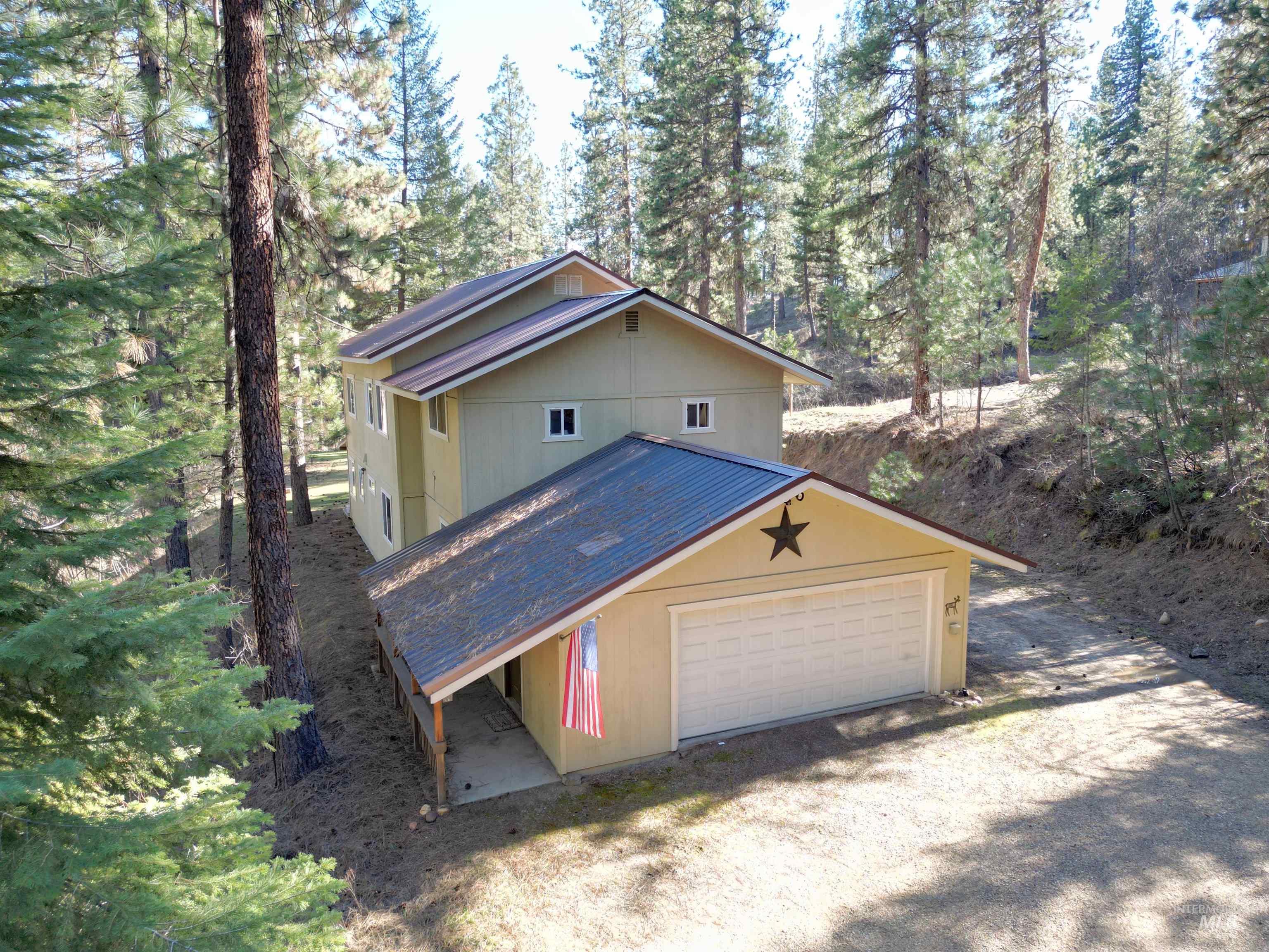 14 Forest Trail Road Garden Valley, ID 83622 - Photo 2 of 45 Garage featuring driveway