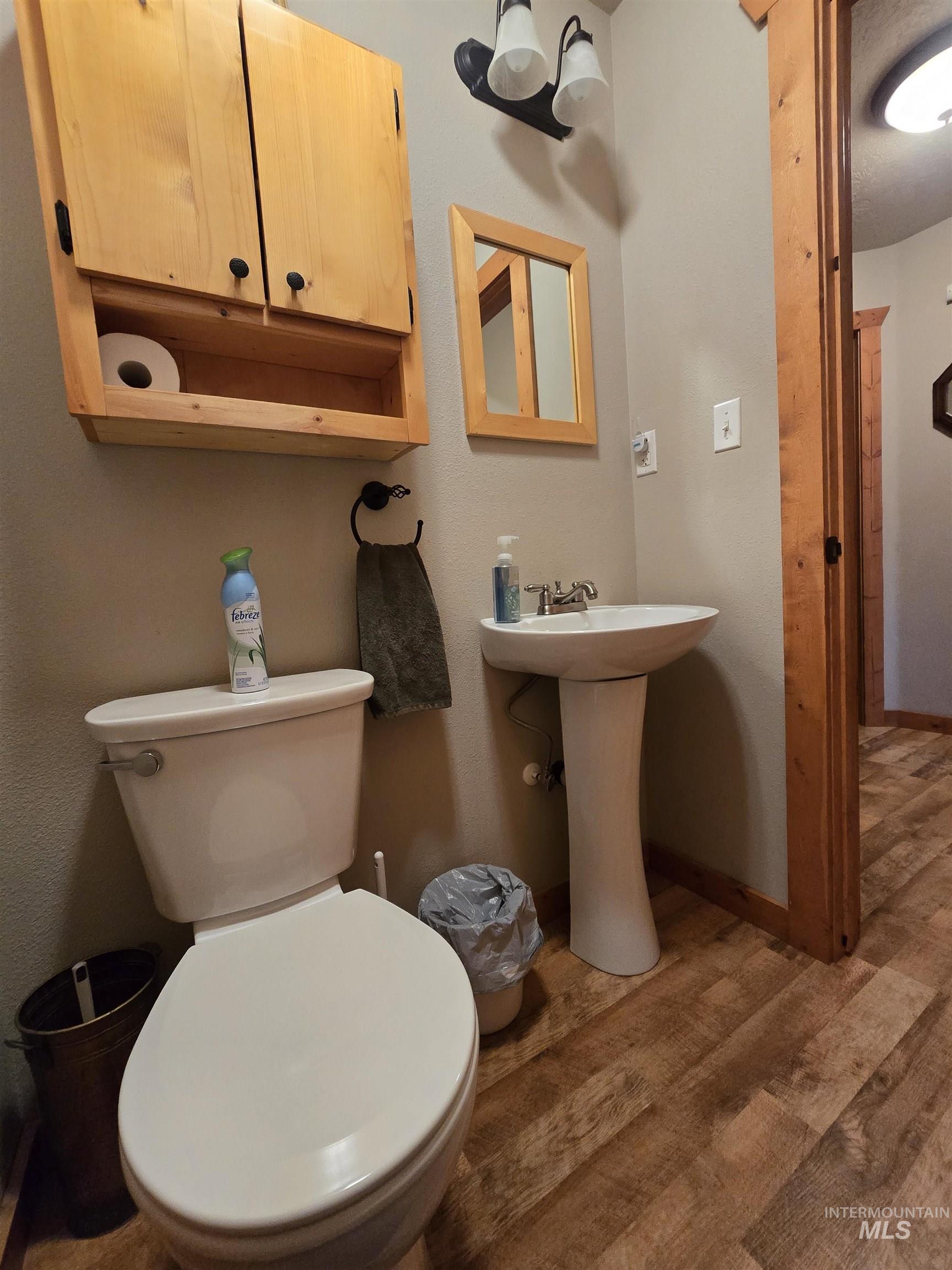 14 Forest Trail Road Garden Valley, ID 83622 - Photo 21 of 45 Bathroom with wood finished floors and toilet
