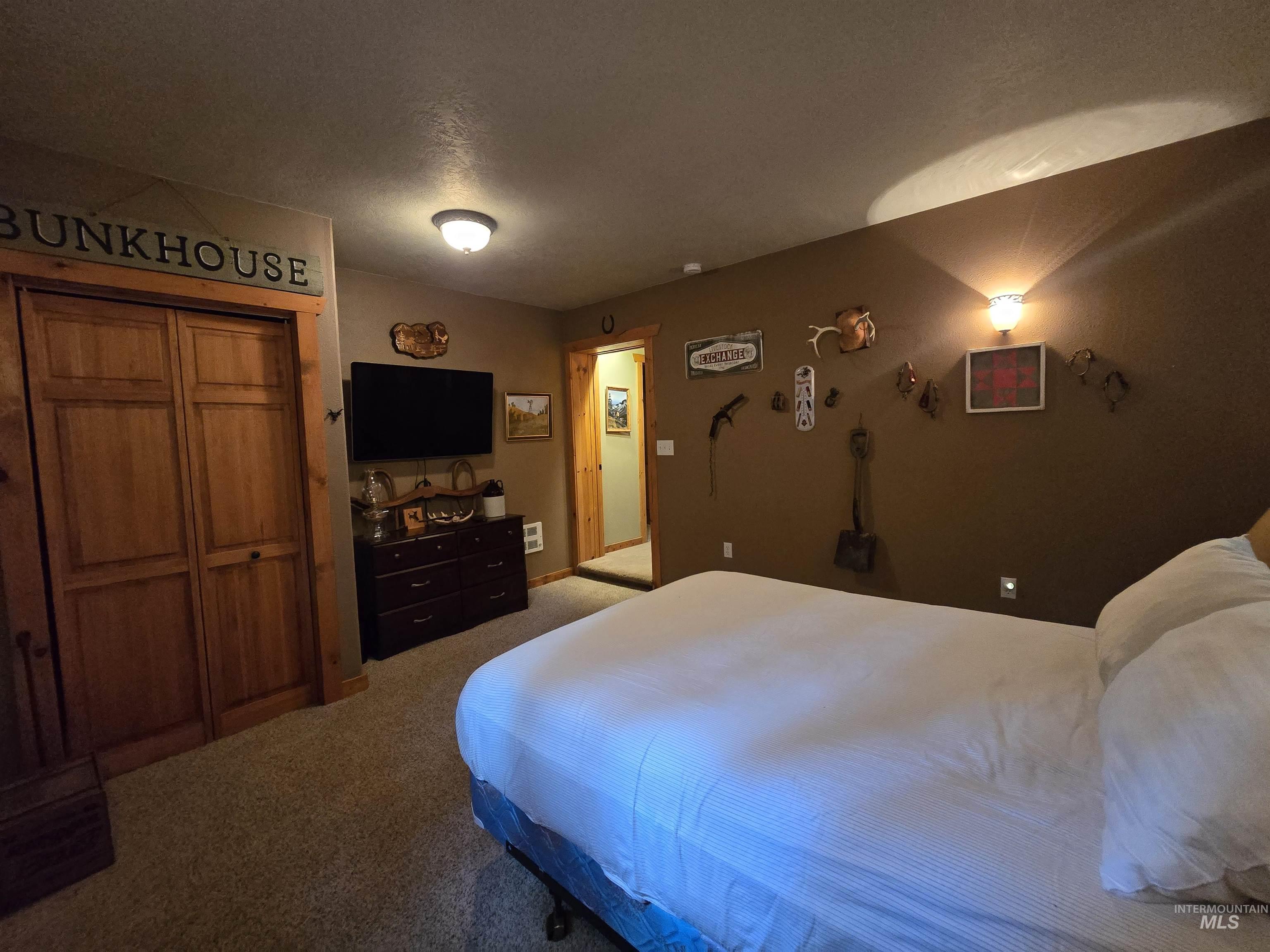 14 Forest Trail Road Garden Valley, ID 83622 - Photo 35 of 45 Bedroom with light carpet and a closet