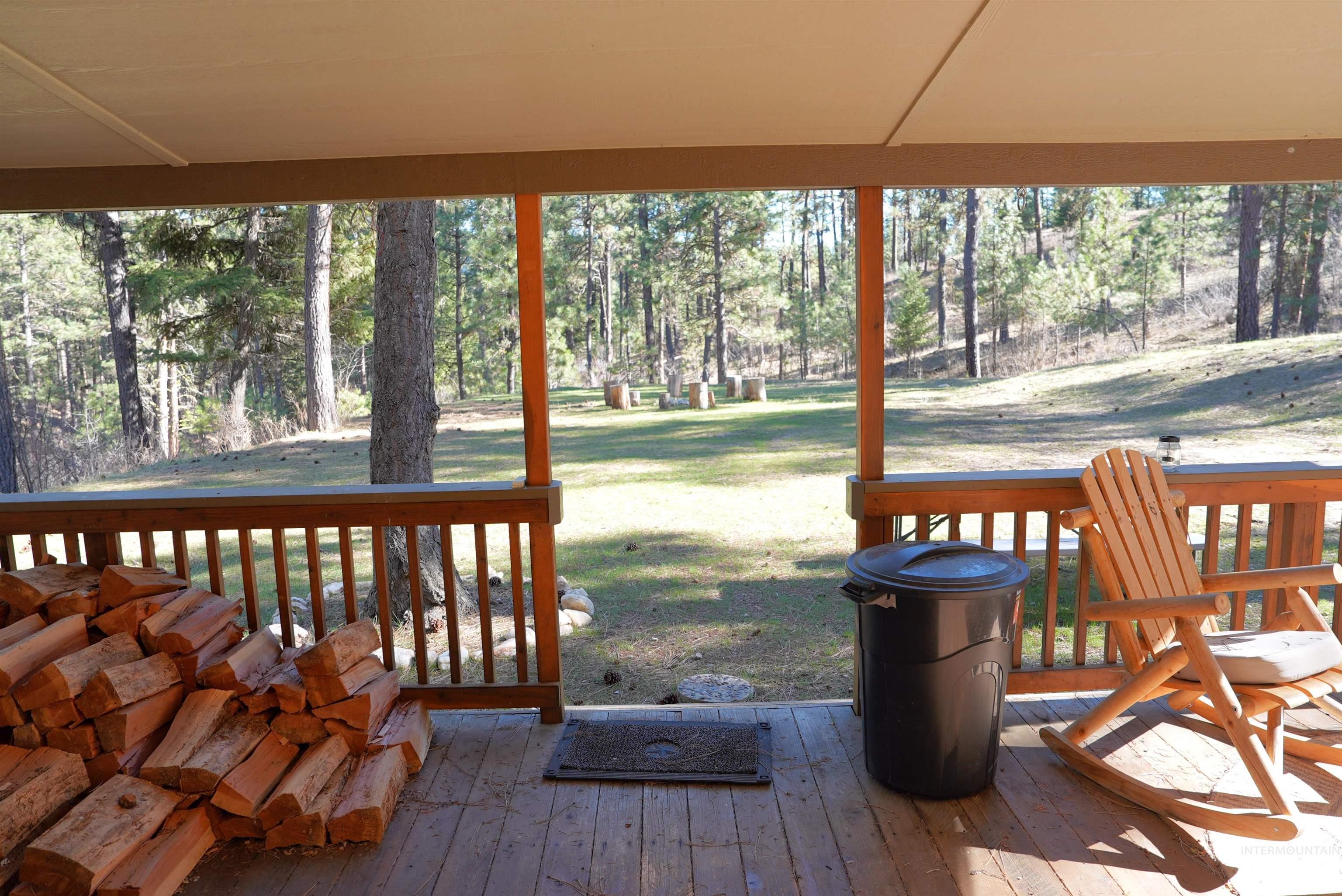 14 Forest Trail Road Garden Valley, ID 83622 - Photo 6 of 45 Wooden terrace featuring a yard and view of scattered trees
