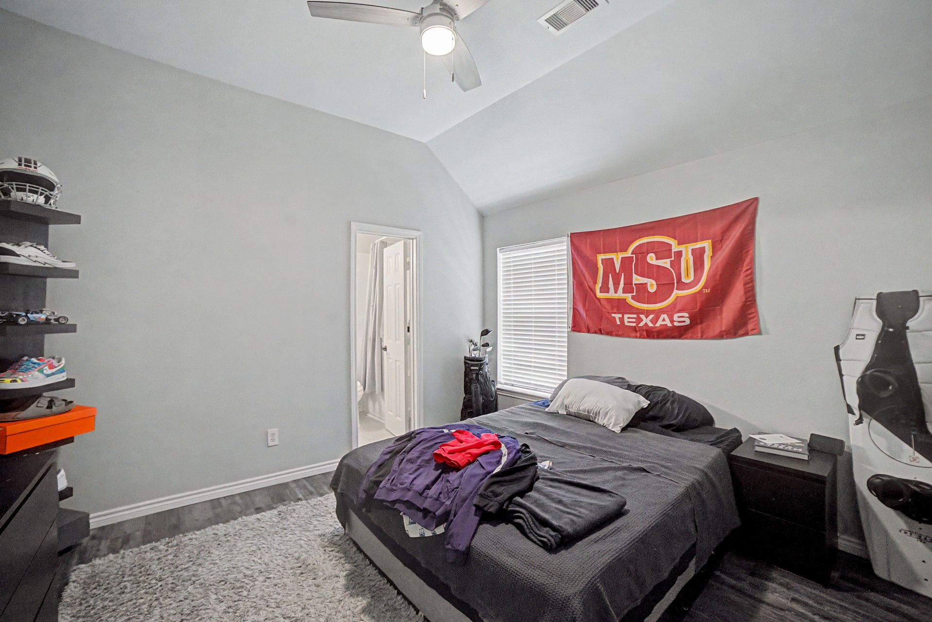 28411 Peper Hollow Lane Spring, TX 77386 - Photo 15 of 24 a bed room with a bed and a couch