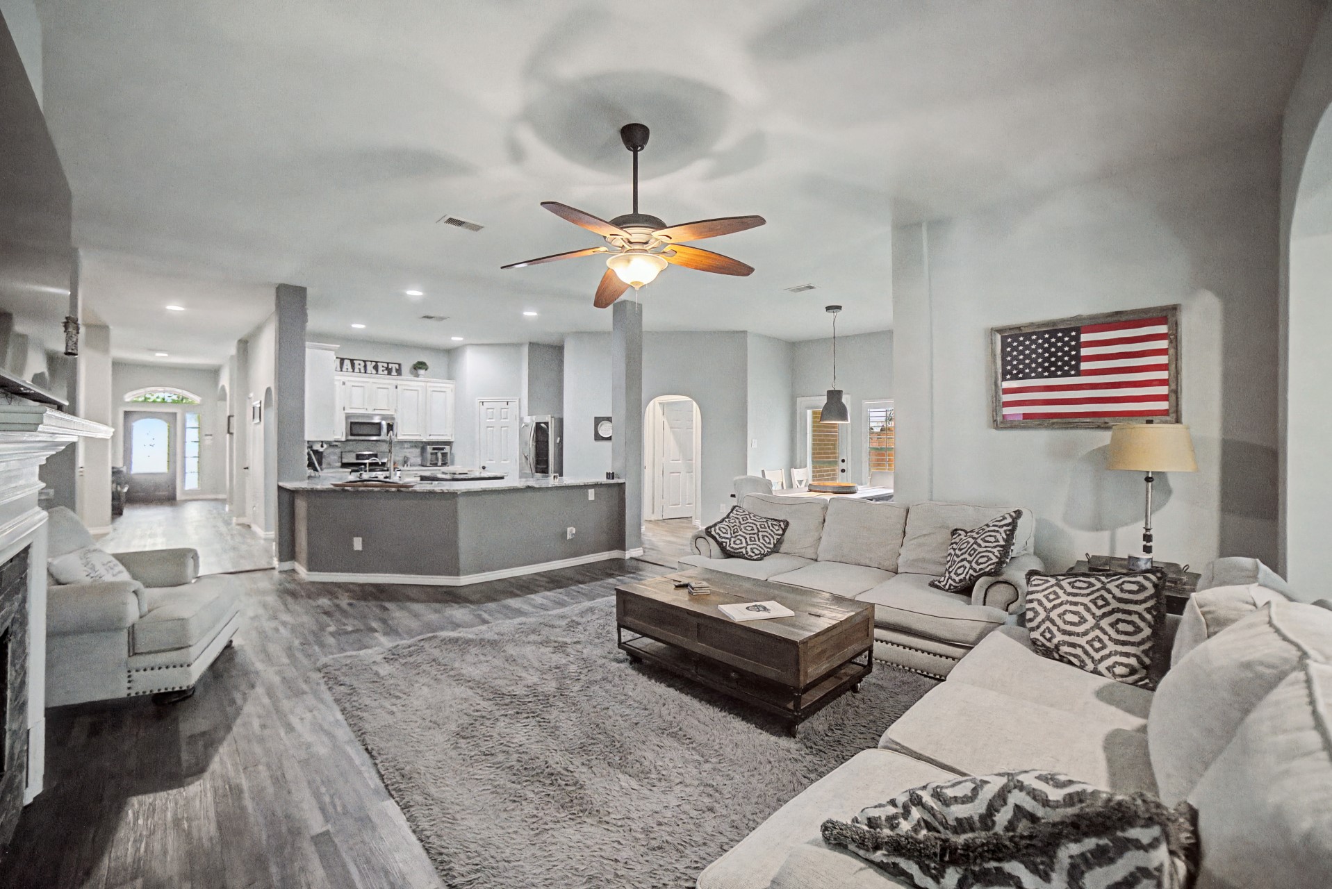 28411 Peper Hollow Lane Spring, TX 77386 - Photo 8 of 24 a living room with furniture kitchen view and a chandelier