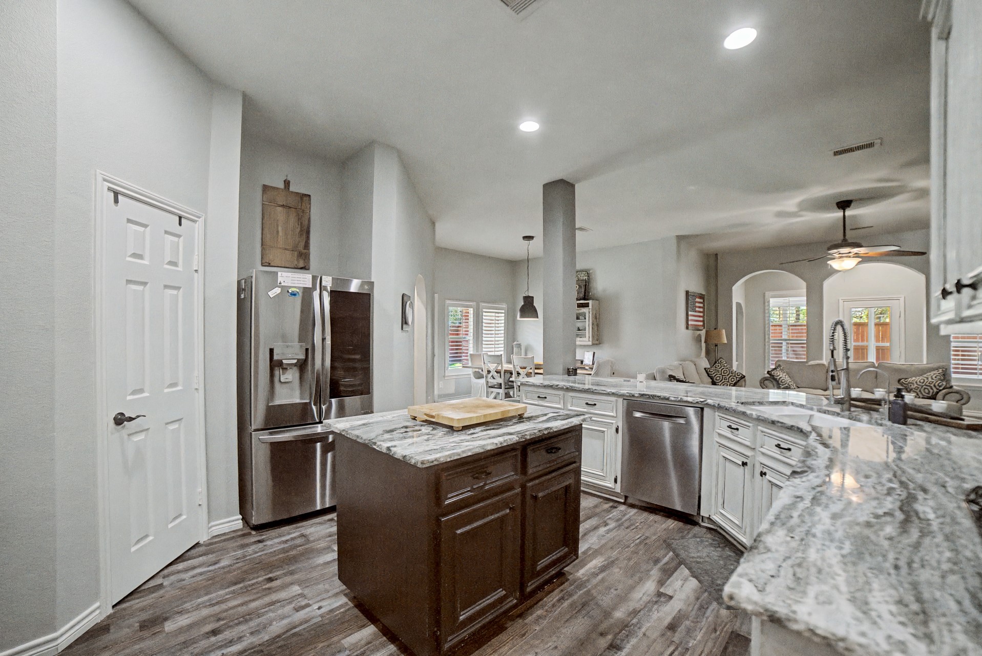 28411 Peper Hollow Lane Spring, TX 77386 - Photo 10 of 24 a kitchen with a sink stove and refrigerator