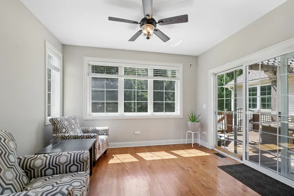 a bedroom with furniture and windows