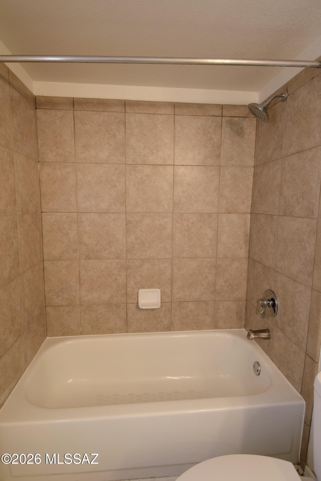 5855 North Kolb Road, Unit 11106 Tucson, AZ 85750 - Photo 20 of 36 a bathroom with a shower and a bathtub
