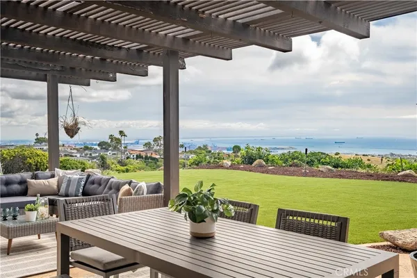 a view of a balcony with lake view and a ocean view
