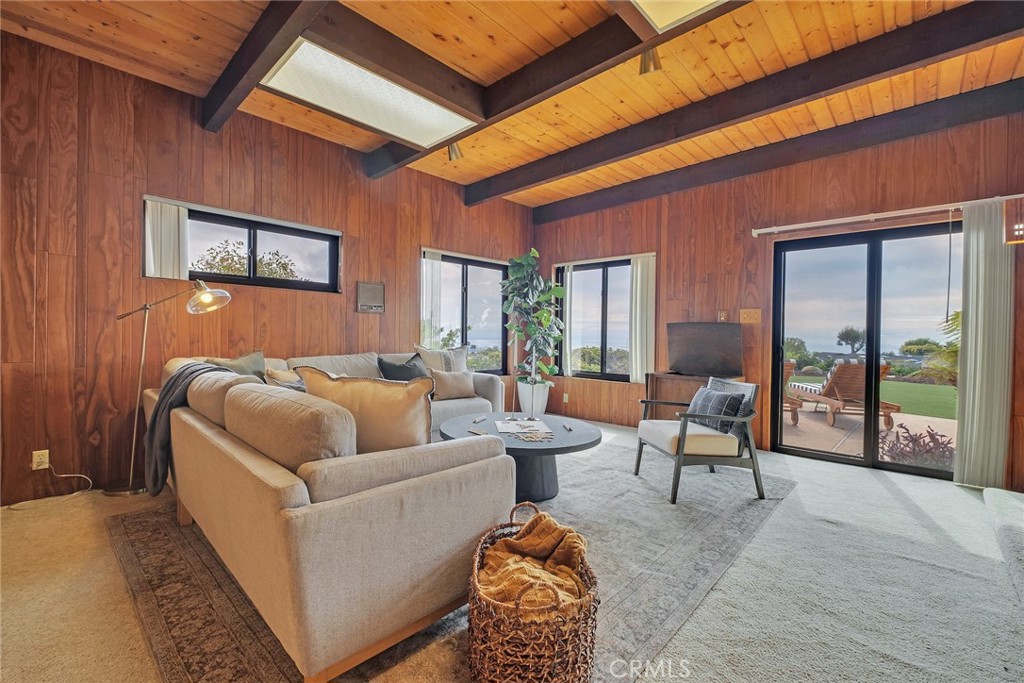 2727 San Ramon Drive Rancho Palos Verdes, CA 90275 - Photo 14 of 58 a living room with furniture and a large window