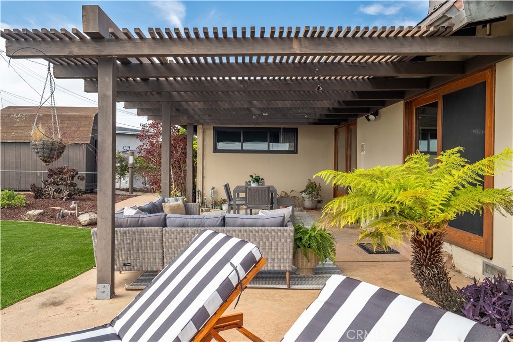 2727 San Ramon Drive Rancho Palos Verdes, CA 90275 - Photo 20 of 58 a view of a porch with chairs and potted plants