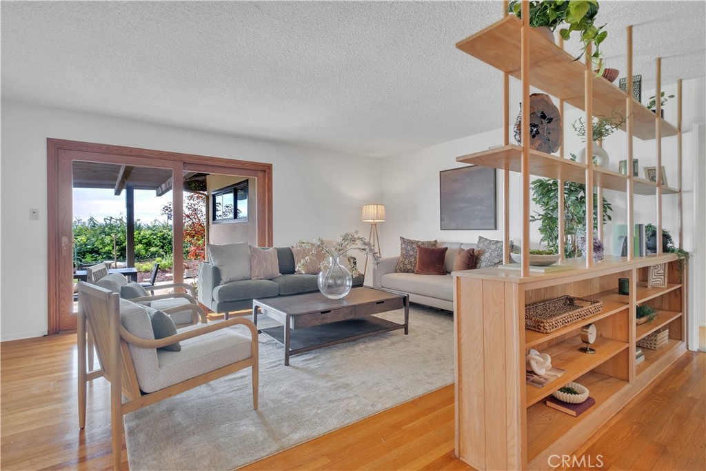 2727 San Ramon Drive Rancho Palos Verdes, CA 90275 - Photo 22 of 58 a living room with furniture and a large window