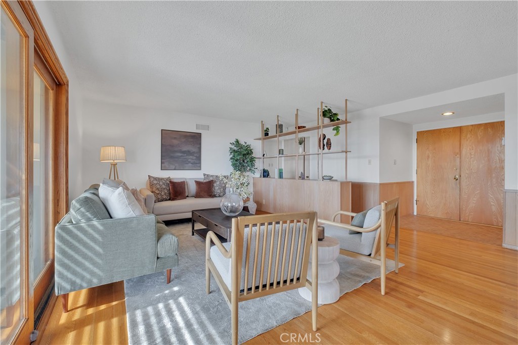 2727 San Ramon Drive Rancho Palos Verdes, CA 90275 - Photo 23 of 58 a living room with furniture and wooden floor