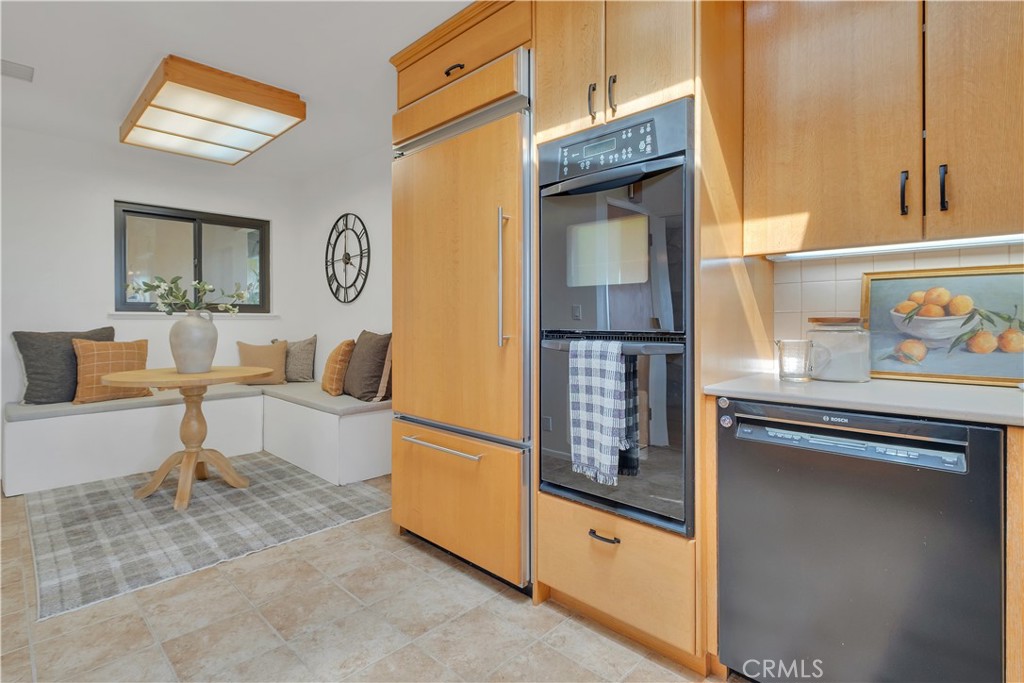2727 San Ramon Drive Rancho Palos Verdes, CA 90275 - Photo 43 of 58 a living room with furniture a window and kitchen view