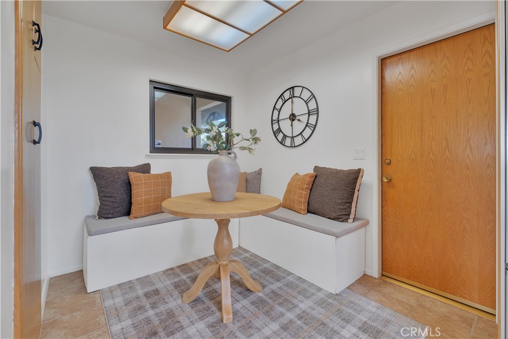2727 San Ramon Drive Rancho Palos Verdes, CA 90275 - Photo 44 of 58 a living room with a bed and paintings on the wall
