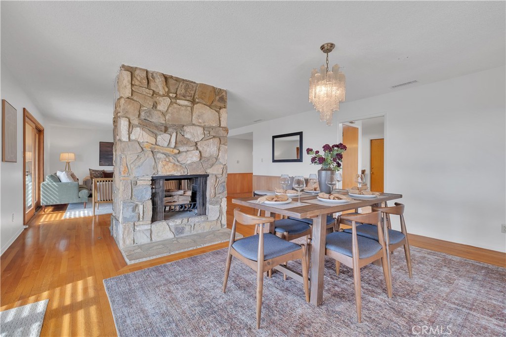 2727 San Ramon Drive Rancho Palos Verdes, CA 90275 - Photo 58 of 58 a view of a dining room with furniture a chandelier and wooden floor