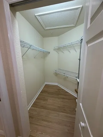 a bathroom with a tub and shower