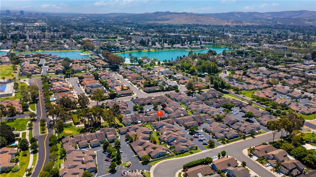 56 Wetstone, Unit 35 Irvine, CA 92604 - Photo 17 of 36 an aerial view of a city with lots of residential buildings