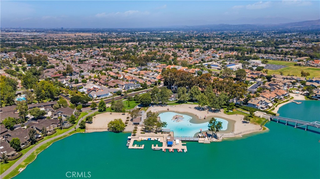 56 Wetstone, Unit 35 Irvine, CA 92604 - Photo 18 of 36 an aerial view of residential houses with outdoor space and trees