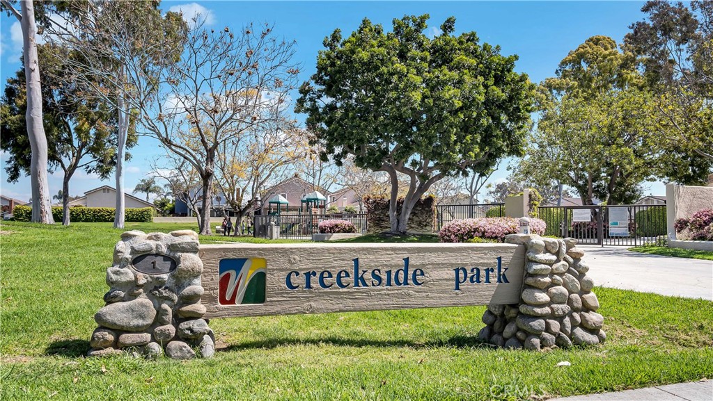 56 Wetstone, Unit 35 Irvine, CA 92604 - Photo 19 of 36 a view of outdoor space with sign board