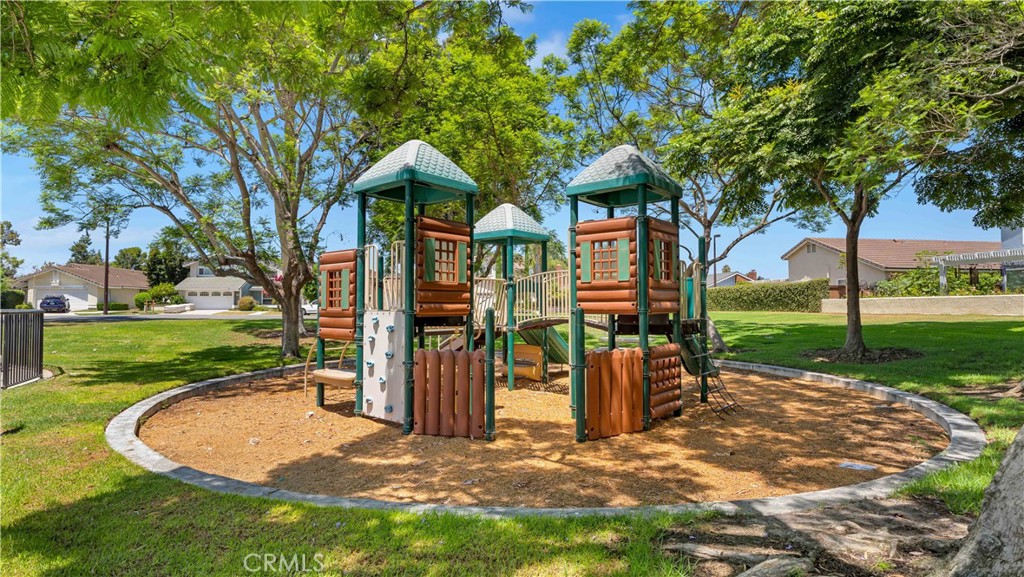 56 Wetstone, Unit 35 Irvine, CA 92604 - Photo 22 of 36 a view of a park with plants and large trees