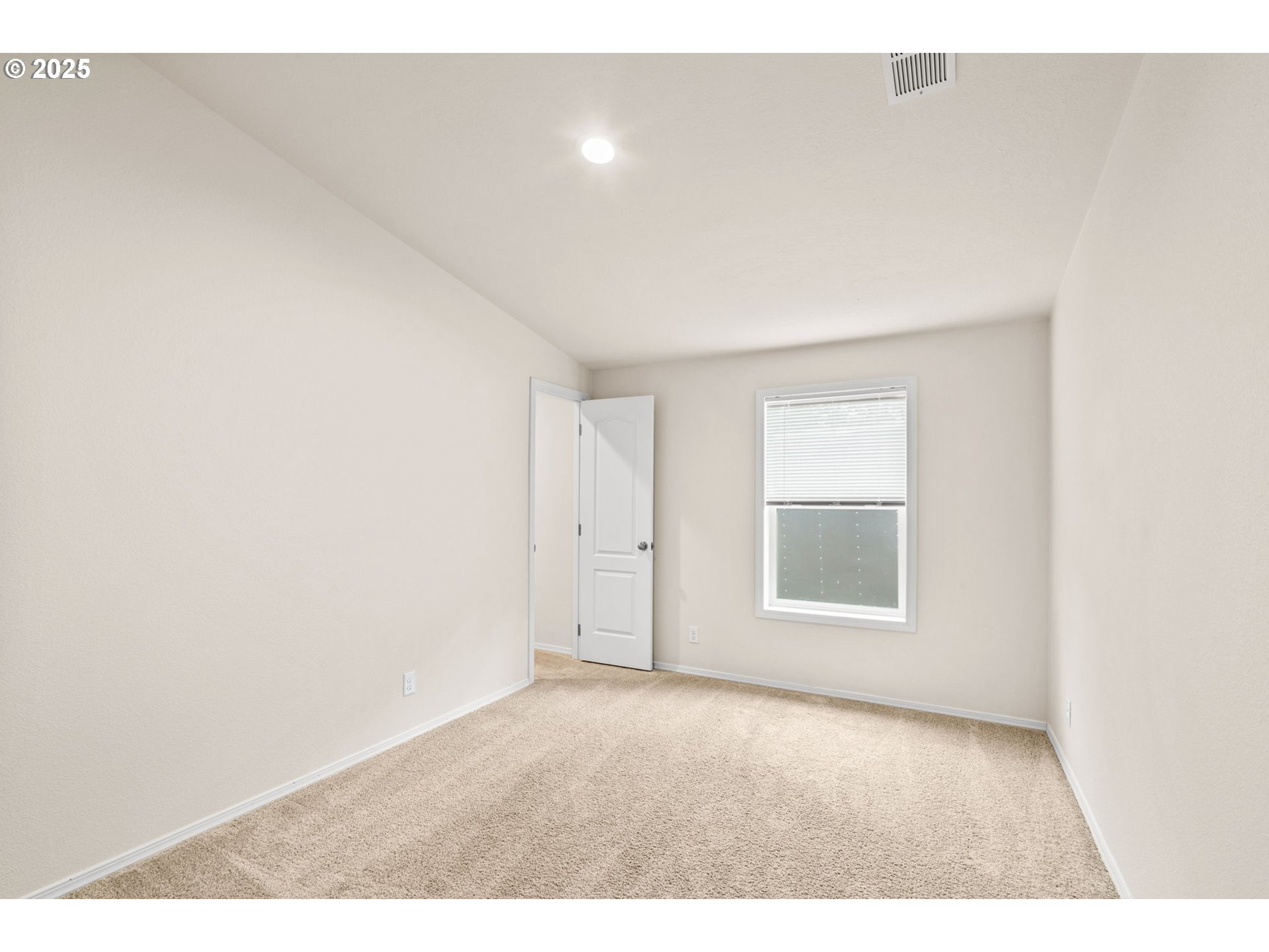39009 Dexter Road, Unit 32 Dexter, OR 97431 - Photo 23 of 36 a view of an empty room with a window