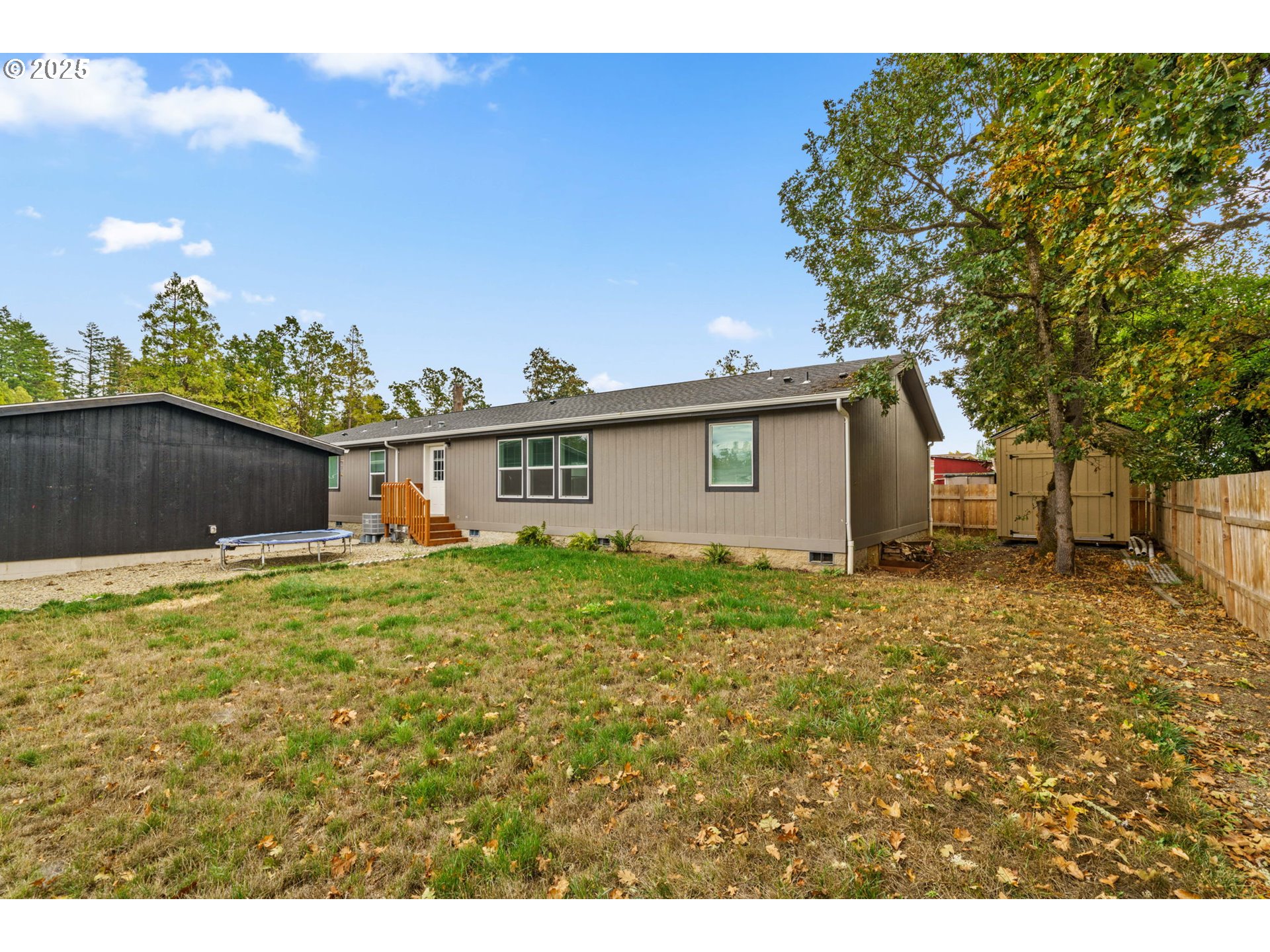 39009 Dexter Road, Unit 32 Dexter, OR 97431 - Photo 32 of 36 a view of a house with a backyard