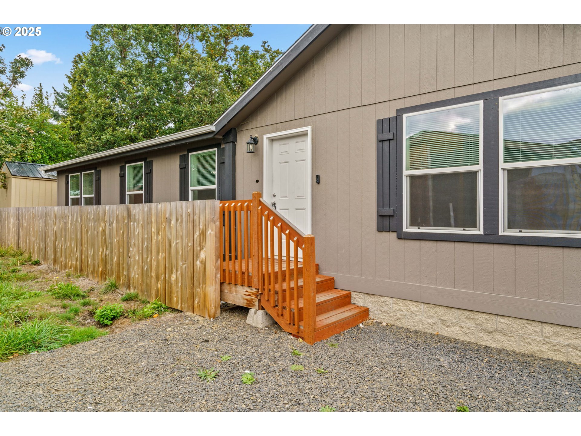 39009 Dexter Road, Unit 32 Dexter, OR 97431 - Photo 36 of 36 a view of backyard with a garden and deck