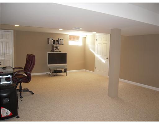 Den/Family/Great Room. Newly finished Game Rm with New carpet, features full bath, ample storage and has access to front of house and garage.