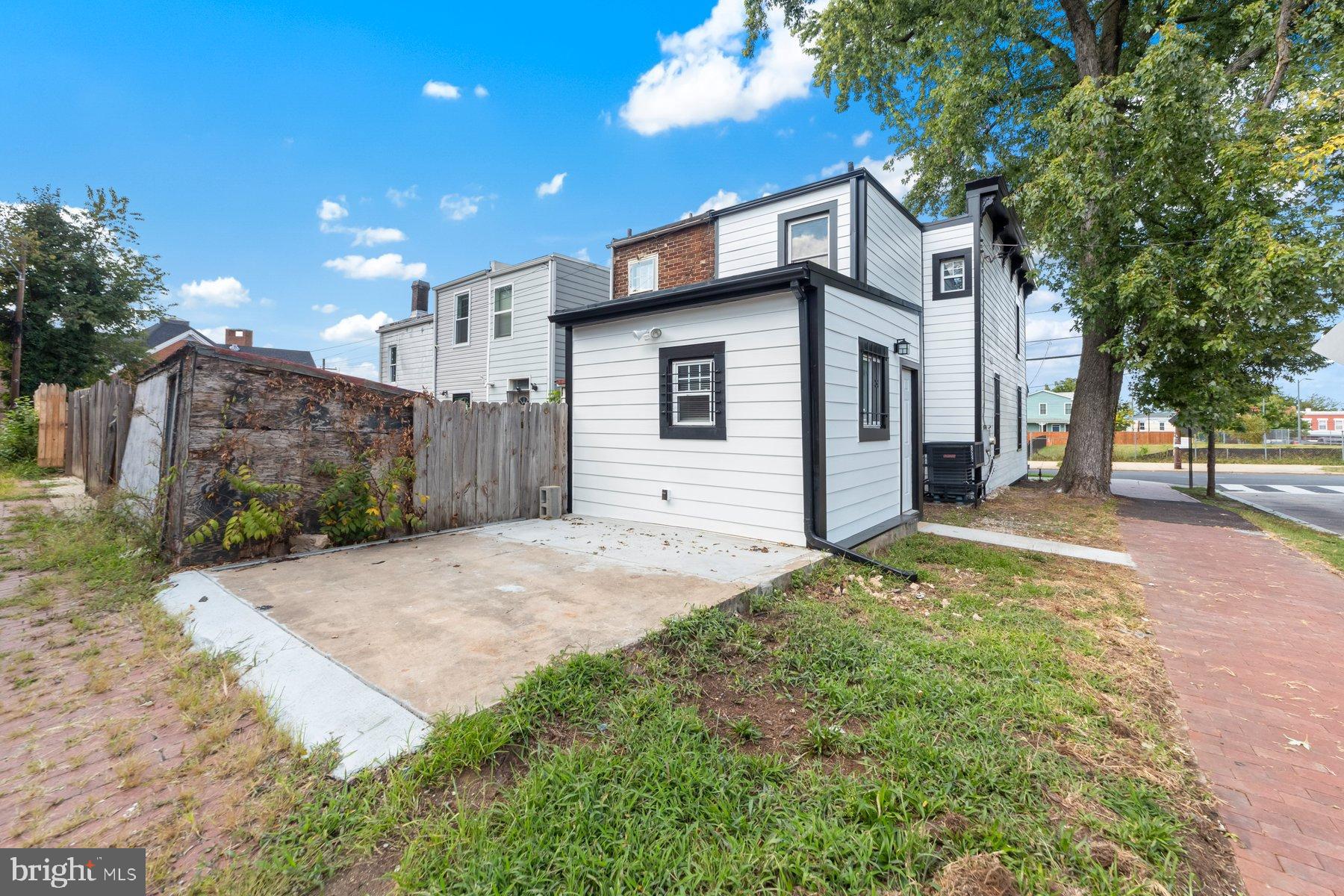 1325 W Street Southeast Washington, DC 20020 - Photo 26 of 26 a front view of a house with a yard