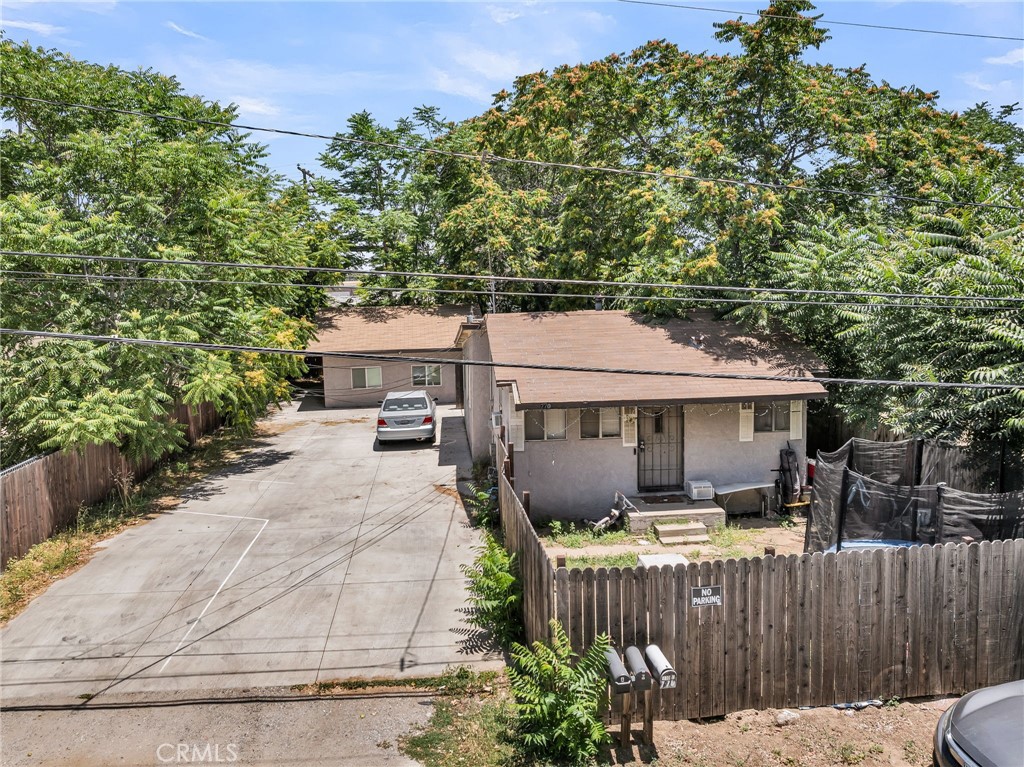 770 Allegheny Street Beaumont, CA 92223 - Photo 2 of 16 a view of a house with backyard and sitting area