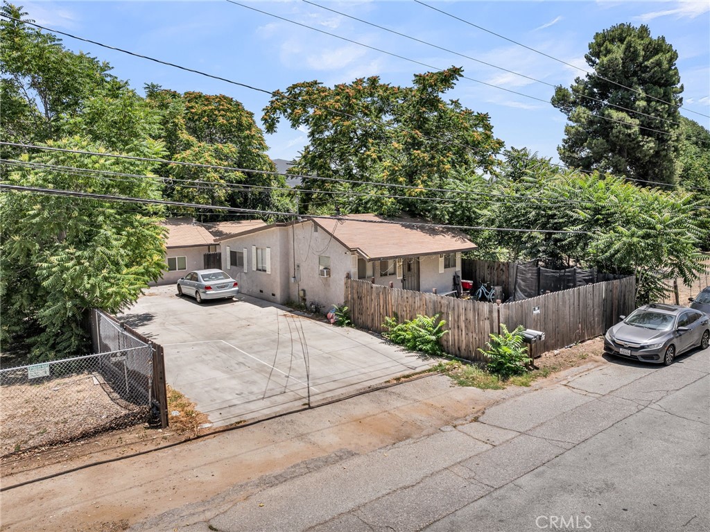 770 Allegheny Street Beaumont, CA 92223 - Photo 3 of 16 a front view of a house with a yard
