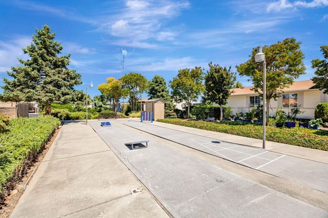 a view of a street with a houses