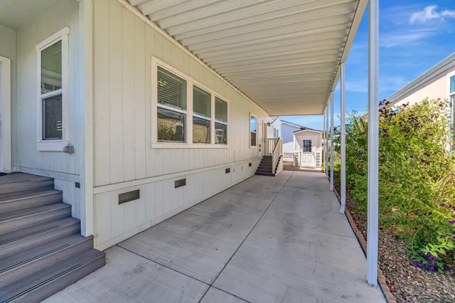 a view of a house with entryway and stairs