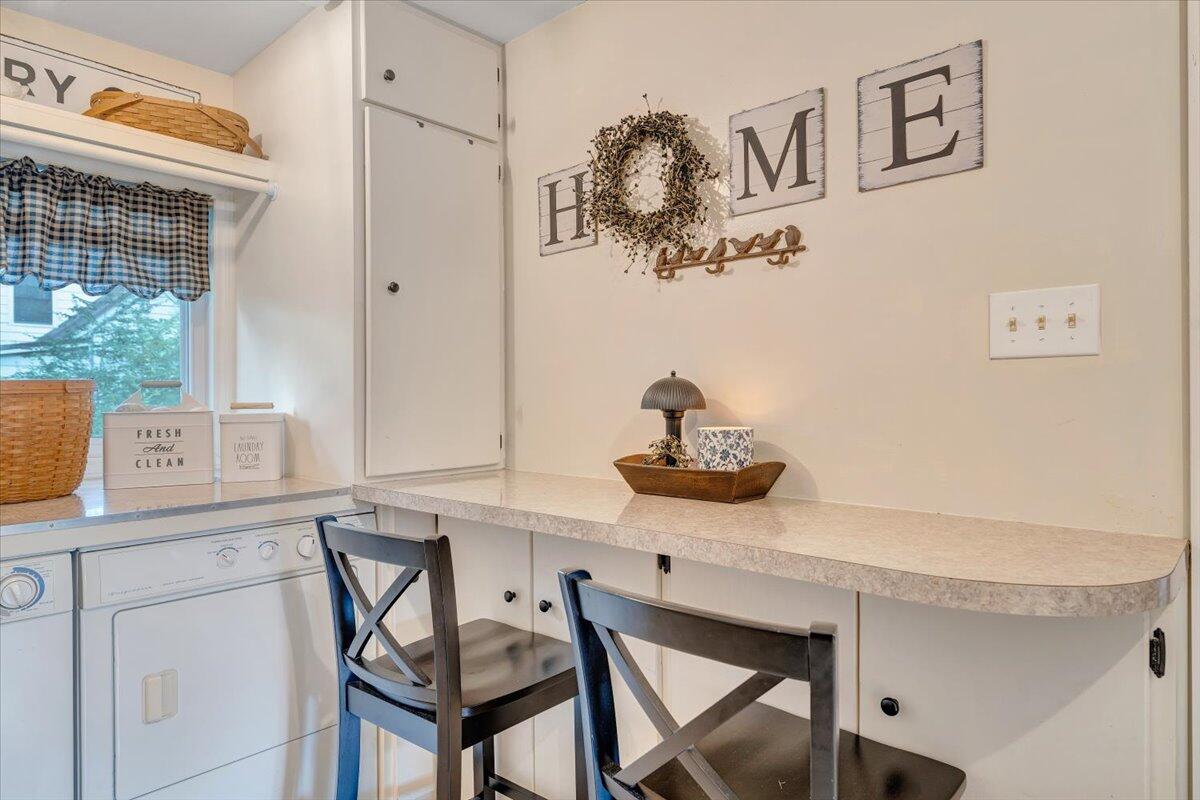 898 Mica Road Ridgeway, VA 24148 - Photo 30 of 60 a view of a room that has a table and a chair in it
