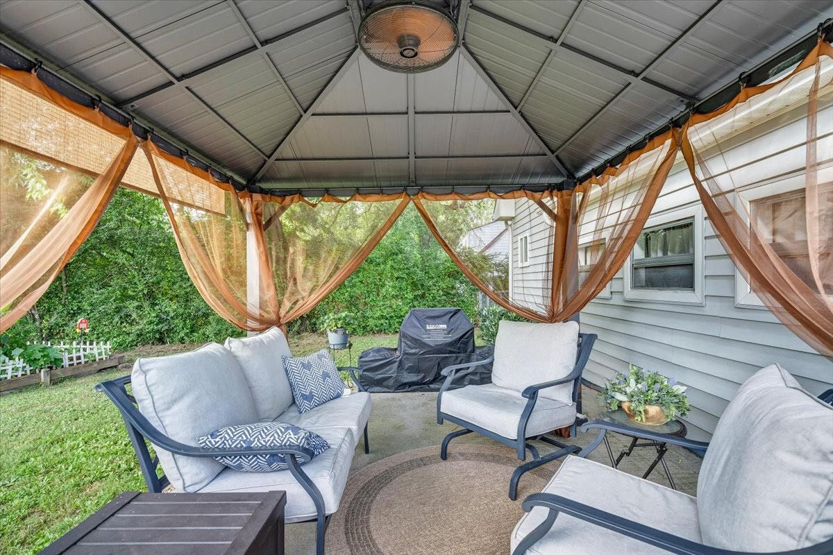 898 Mica Road Ridgeway, VA 24148 - Photo 40 of 60 a outdoor living space with furniture and garden view