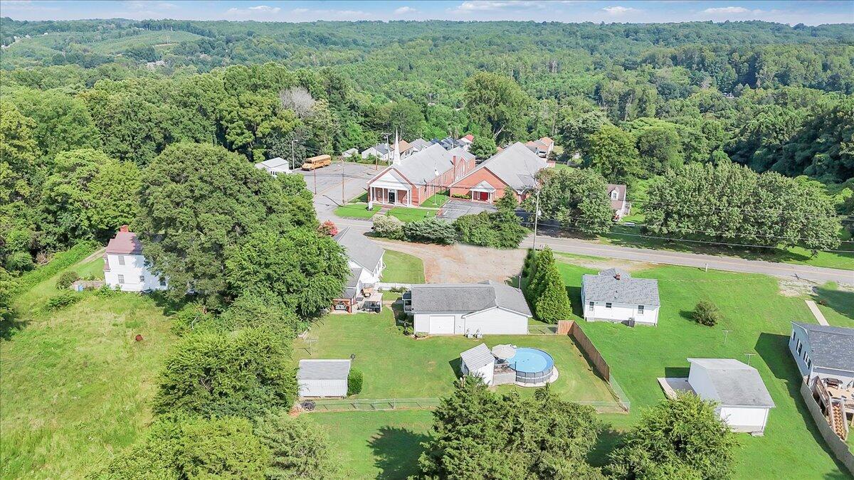 898 Mica Road Ridgeway, VA 24148 - Photo 54 of 60 an aerial view of a house with a garden
