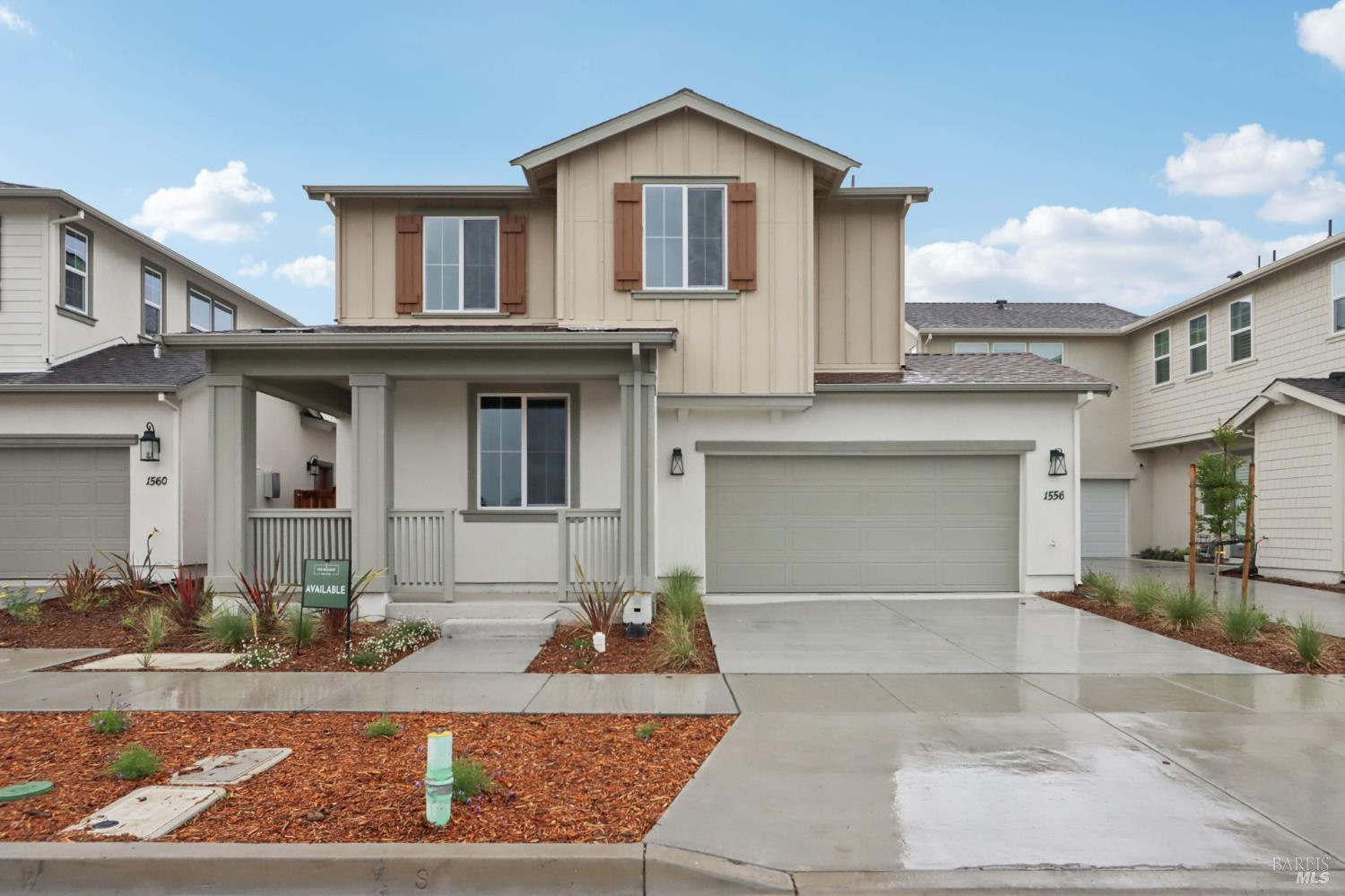 1556 Country Manor Drive Santa Rosa, CA 95403 - Photo 1 of 40 a front view of a house with garden