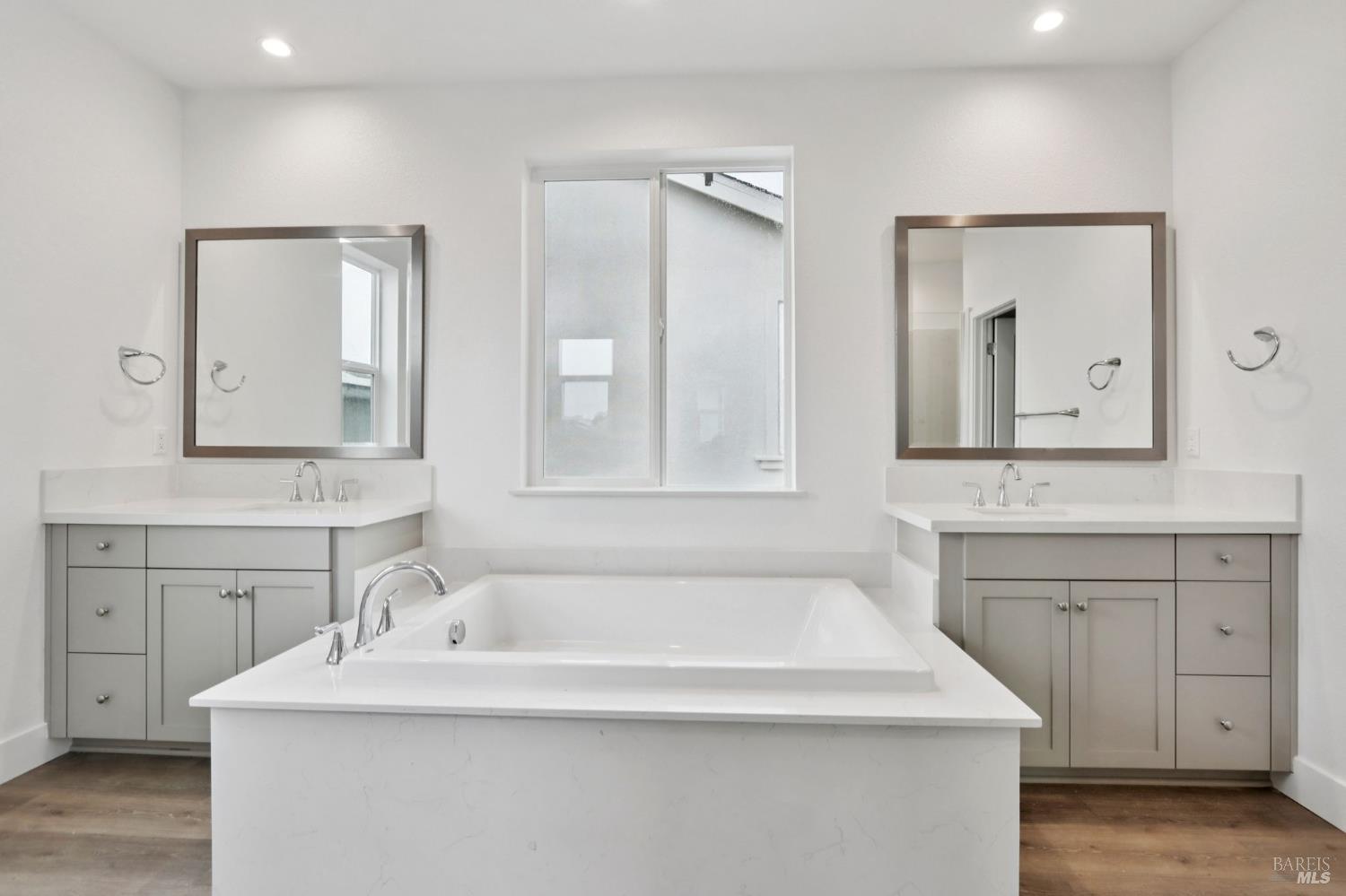 1556 Country Manor Drive Santa Rosa, CA 95403 - Photo 37 of 40 a bathroom with a sink and a mirror