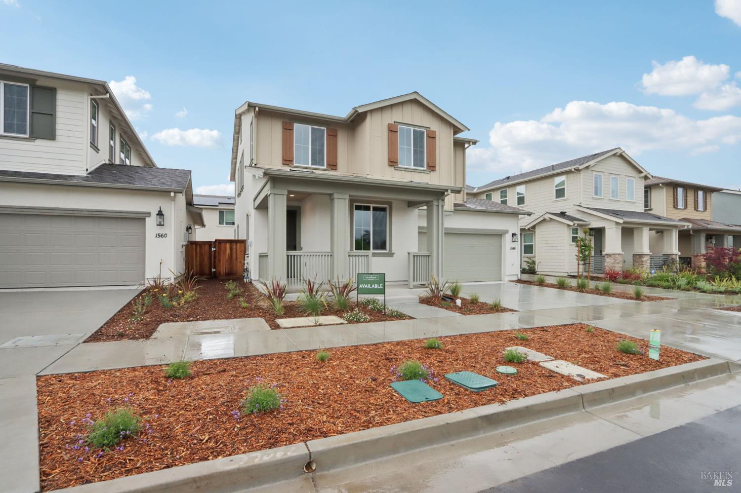1556 Country Manor Drive Santa Rosa, CA 95403 - Photo 4 of 40 a front view of a house with garden