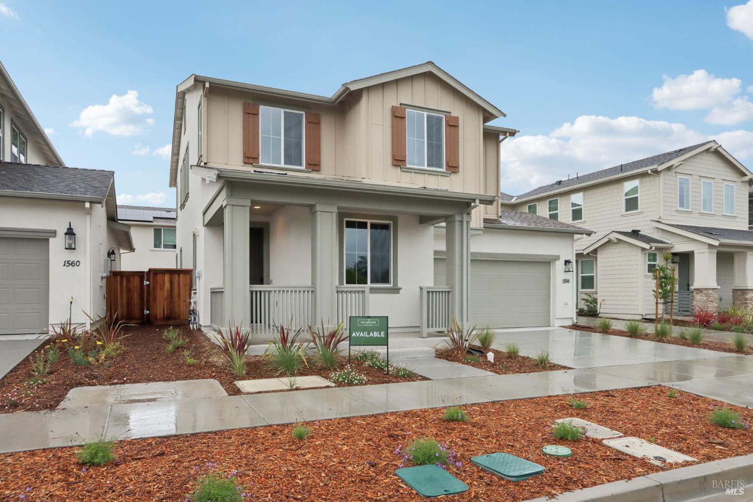 1556 Country Manor Drive Santa Rosa, CA 95403 - Photo 5 of 40 a front view of a house with garden