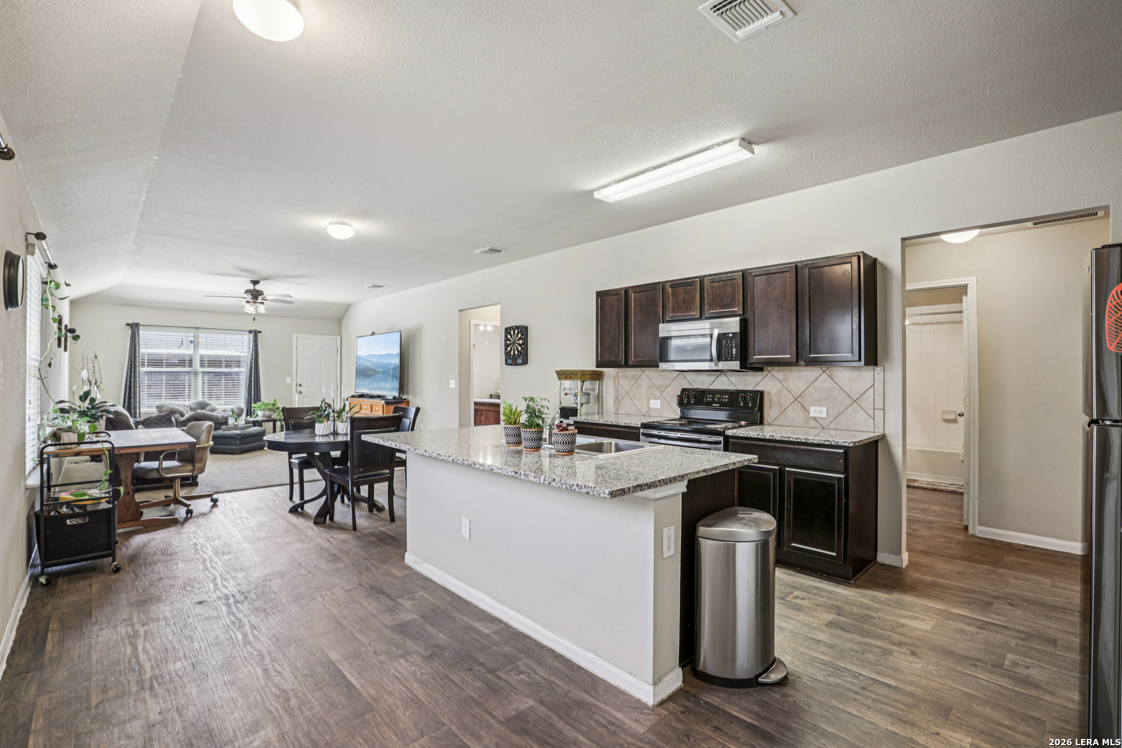 12103 Riprap Drive Manor, TX 78653 - Photo 7 of 13 a kitchen with lots of counter top space and appliances